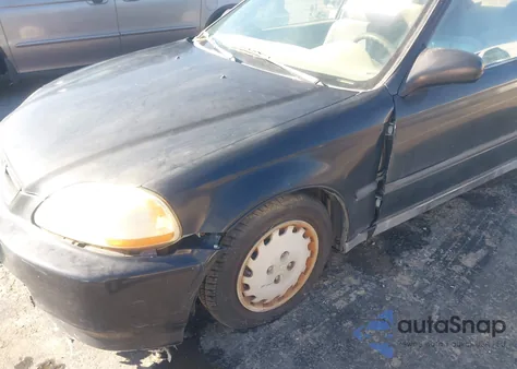 1997 Honda Civic Dx z USA, uszkodzony, nr VIN 1HGEJ6121VL014552